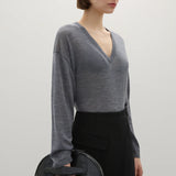 A Emery The Halloran Clutch | Black Embossed Croc